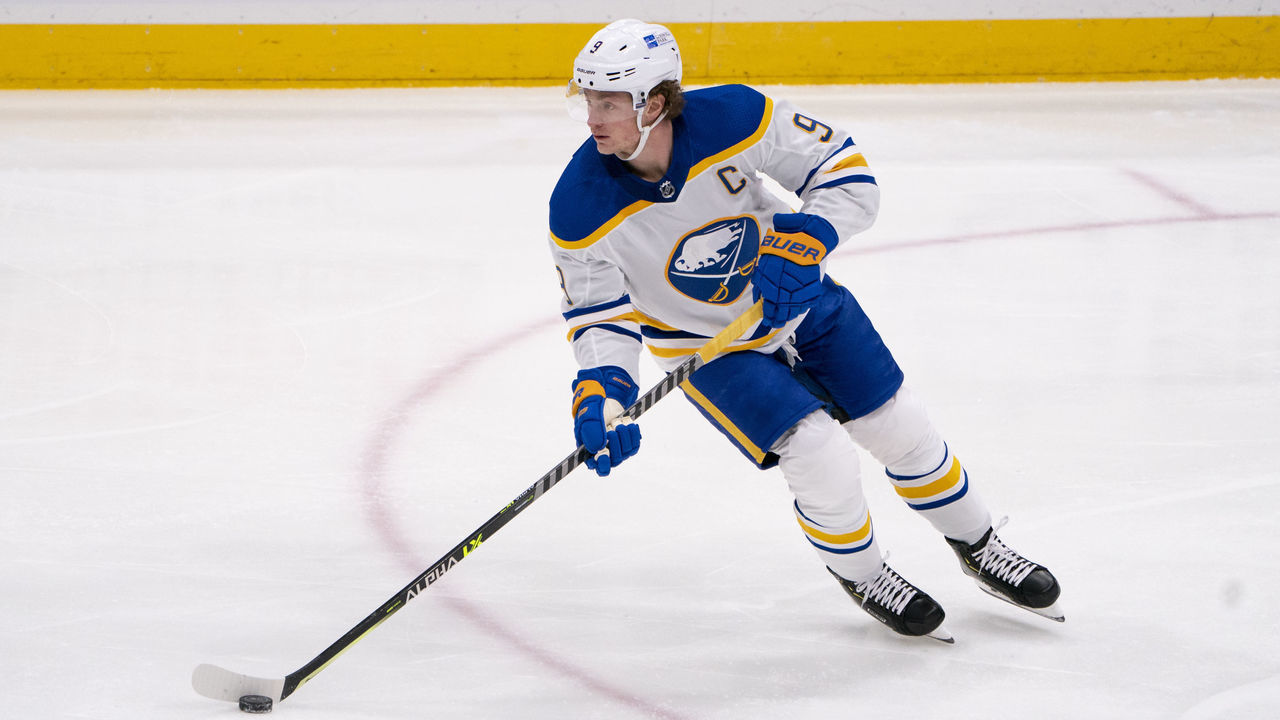 UNIONDALE, NY - MARCH 07: Buffalo Sabres Center Jack Eichel (9) skates with the puck during the first period of the National Hockey League game between the Buffalo Sabres and the New York Islanders on March 7, 2021, at the Nassau Veterans Memorial Coliseum in Uniondale, NY.