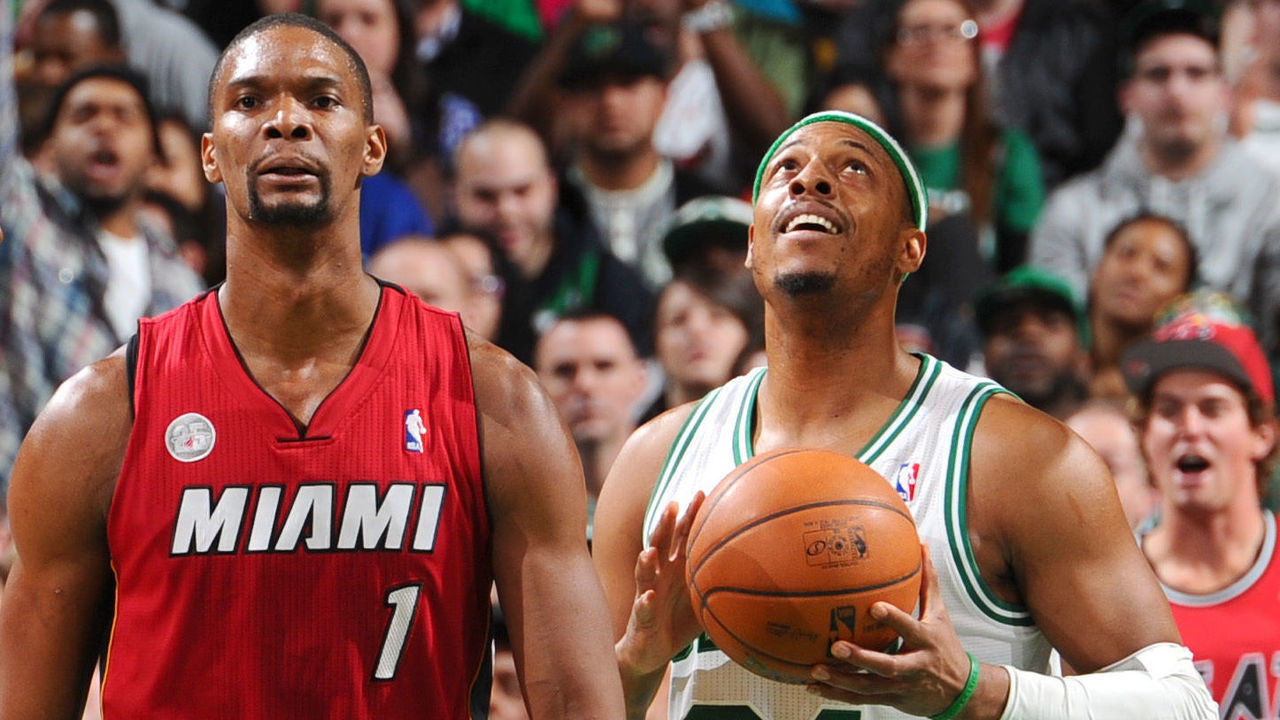 BOSTON, MA - MARCH 18: Paul Pierce #34 of the Boston Celtics holds the ball after a play against Chris Bosh #1 of the Miami Heat on March 18, 2013 at the TD Garden in Boston, Massachusetts. Mandatory Copyright Notice: Copyright 2013 NBAE