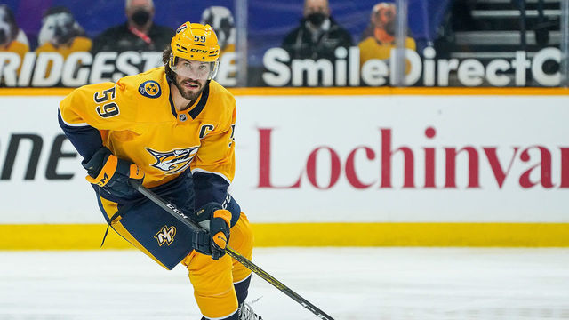 NASHVILLE, TN - MARCH 2: Roman Josi #59 of the Nashville Predators skates against the Carolina Hurricanes at Bridgestone Arena on March 2, 2021 in Nashville, Tennessee.
