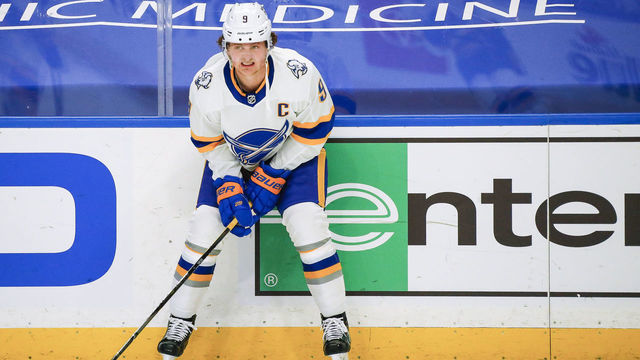 BUFFALO, NY - JANUARY 31: Buffalo Sabres center Jack Eichel (9) appears to be grimacing during warmups prior to the New Jersey Devils and Buffalo Sabres NHL game on February 25, 2021, at KeyBank Center in Buffalo, NY.