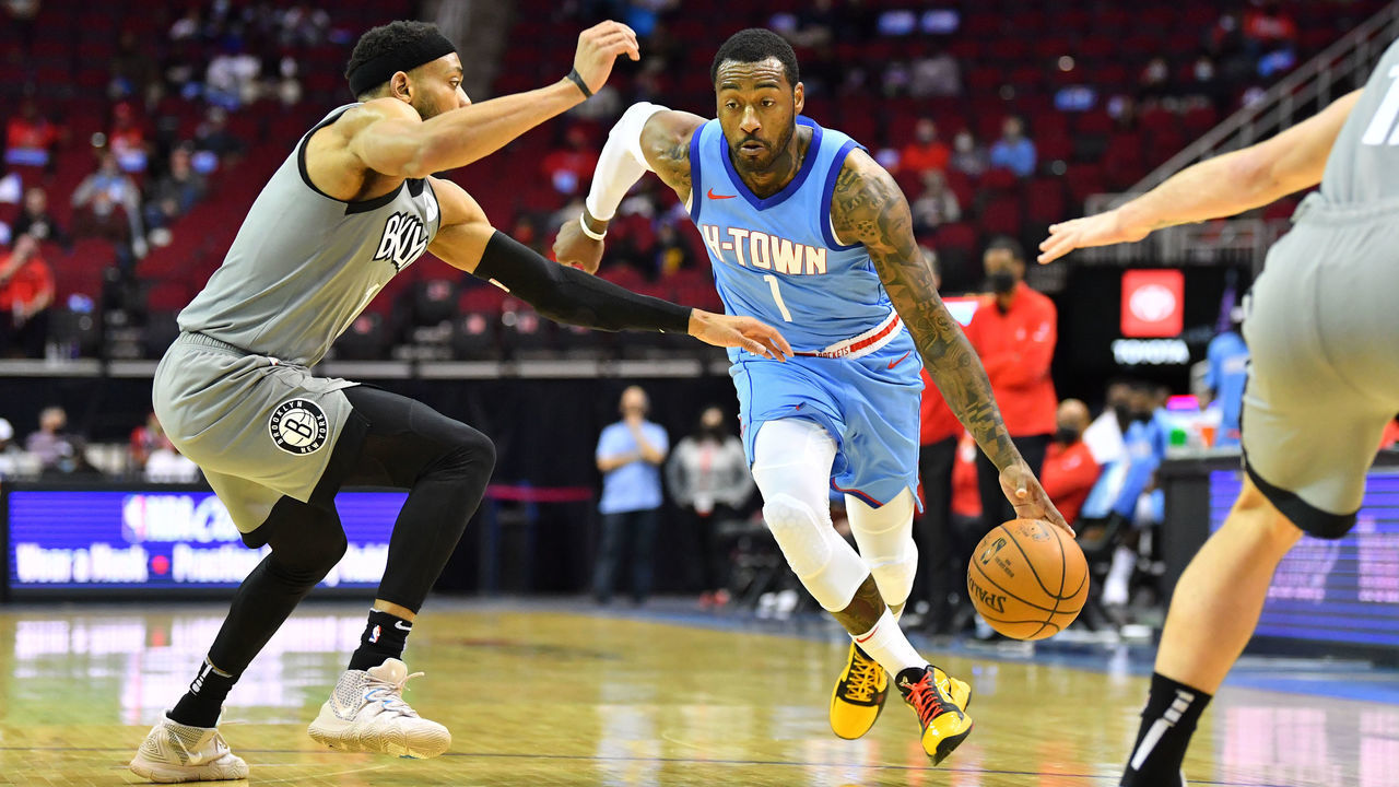 HOUSTON, TX - MARCH 3: John Wall #1 of the Houston Rockets drives to the basket during the game against the Brooklyn Nets on March 3, 2021 at the Toyota Center in Houston, Texas. Mandatory Copyright Notice: Copyright 2021 NBAE