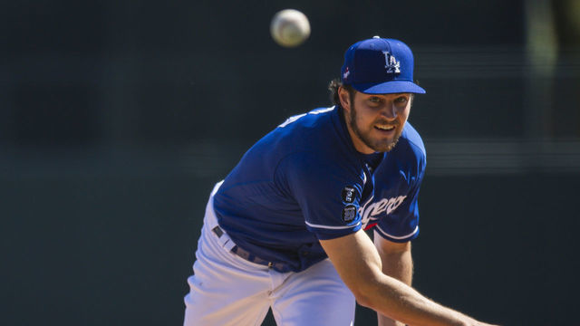 GLENDALE, AZ - MARCH 06: Trevor Bauer #27 of the Los Angeles Dodgers delivers a pitch against the San Diego Padres at Camelback Ranch on March 6, 2021 in Glendale, Arizona.