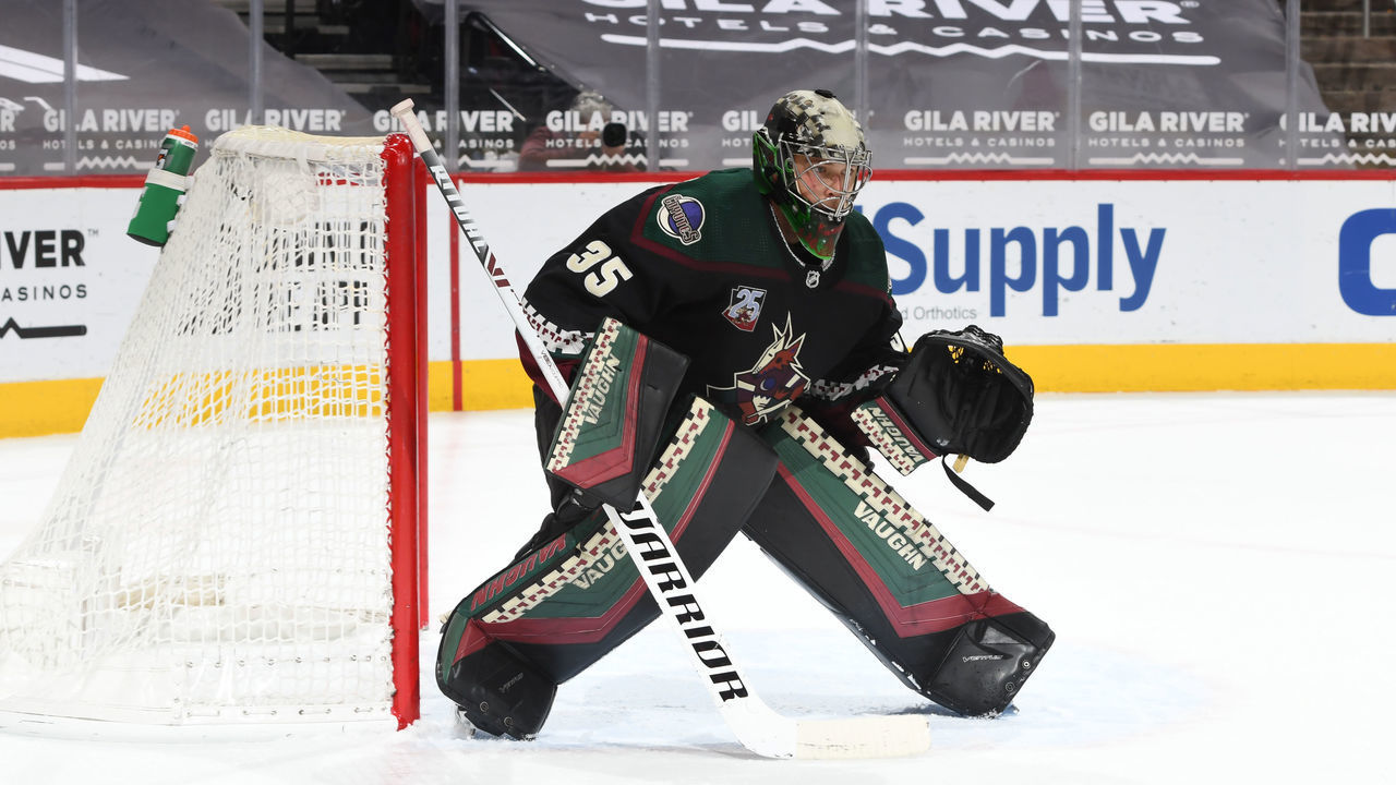 GLENDALE, ARIZONA - FEBRUARY 22: Darcy Kuemper #35 of the Arizona Coyotes gets ready to make a save against the Anaheim Ducks at Gila River Arena on February 22, 2021 in Glendale, Arizona.