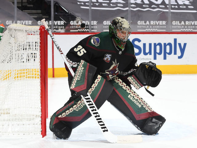 GLENDALE, ARIZONA - FEBRUARY 22: Darcy Kuemper #35 of the Arizona Coyotes gets ready to make a save against the Anaheim Ducks at Gila River Arena on February 22, 2021 in Glendale, Arizona.