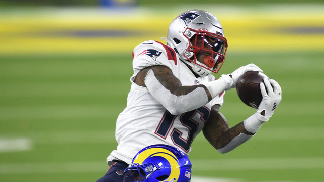 INGLEWOOD, CALIFORNIA - DECEMBER 10: N'Keal Harry #15 of the New England Patriots makes a catch for a first down in front of Darious Williams #31 of the Los Angeles Rams during the third quarter in a 24-3 Los Angeles Rams win at SoFi Stadium on December 10, 2020 in Inglewood, California.