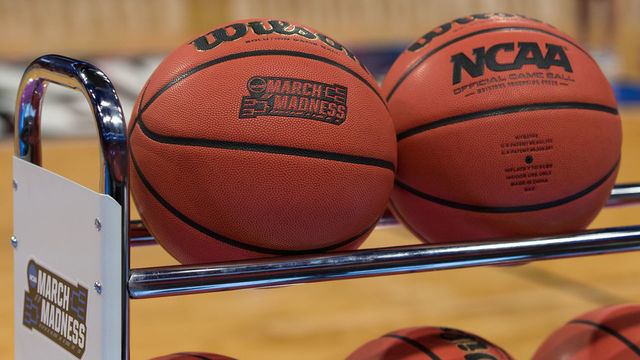 DETROIT, MI - MARCH 15: A detail view of the March Madness logo that is embossed into the official tournament basketballs is seen during an open public practice during the practice day before the first round of the 2018 NCAA Tournament on March 15, 2018 at Little Caesars Arena, in Detroit, Michigan.