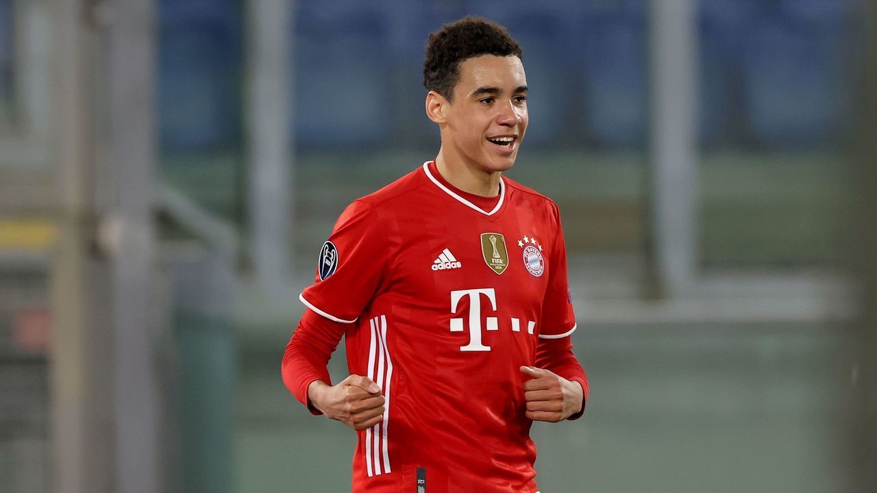 ROME, ITALY - FEBRUARY 23: Jamal Musiala of FC Bayern München celebrates scoring the 2nd team goal during the UEFA Champions League Round of 16 match between Lazio Roma and Bayern München at Olimpico Stadium on February 23, 2021 in Rome, Italy.