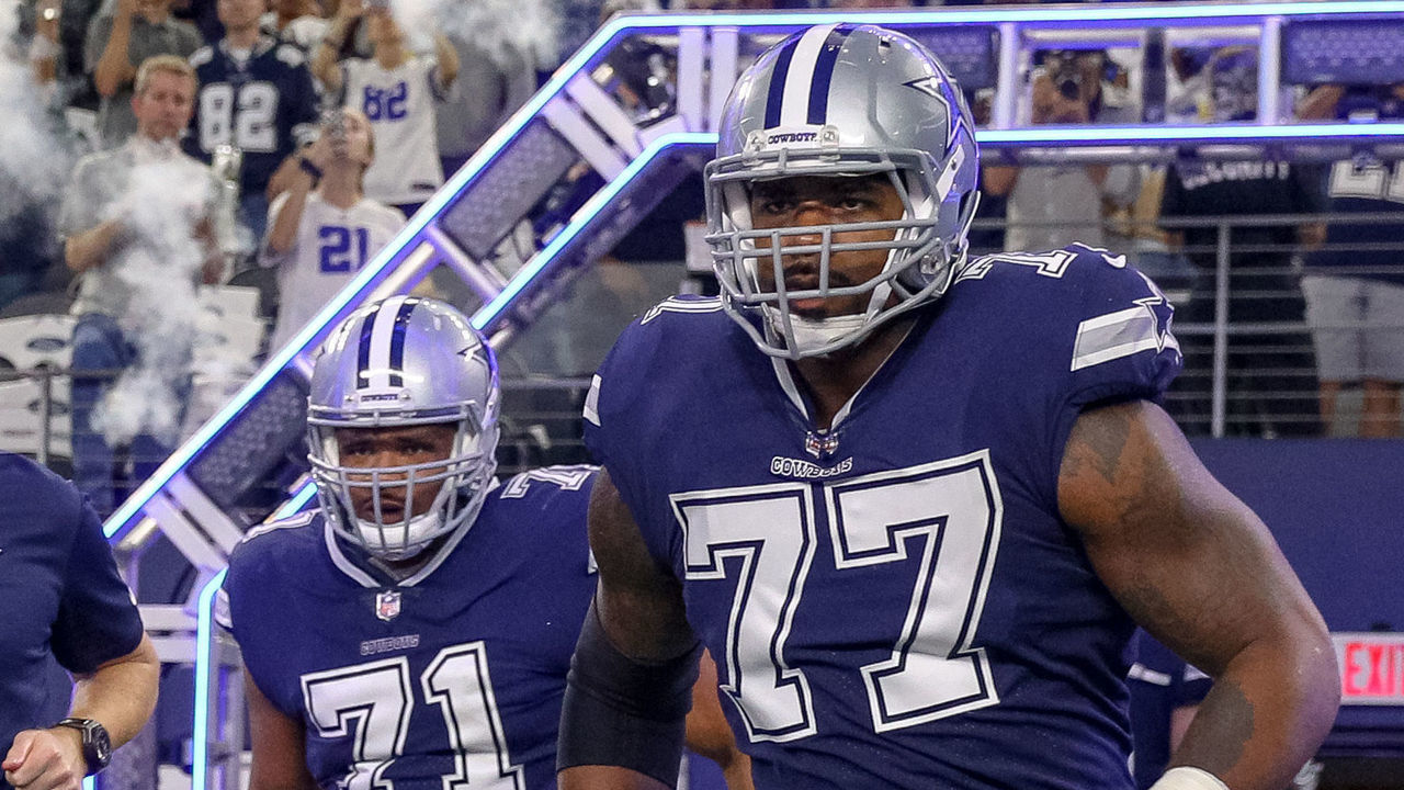 ARLINGTON, TX - NOVEMBER 05: Dallas Cowboys head coach Jason Garrett, offensive tackle La'el Collins (71) and offensive tackle Tyron Smith (77) lead the team out of the tunnel prior to the game between the Tennessee Titans and Dallas Cowboys on November 5, 2018 at AT&T Stadium in Arlington, TX.