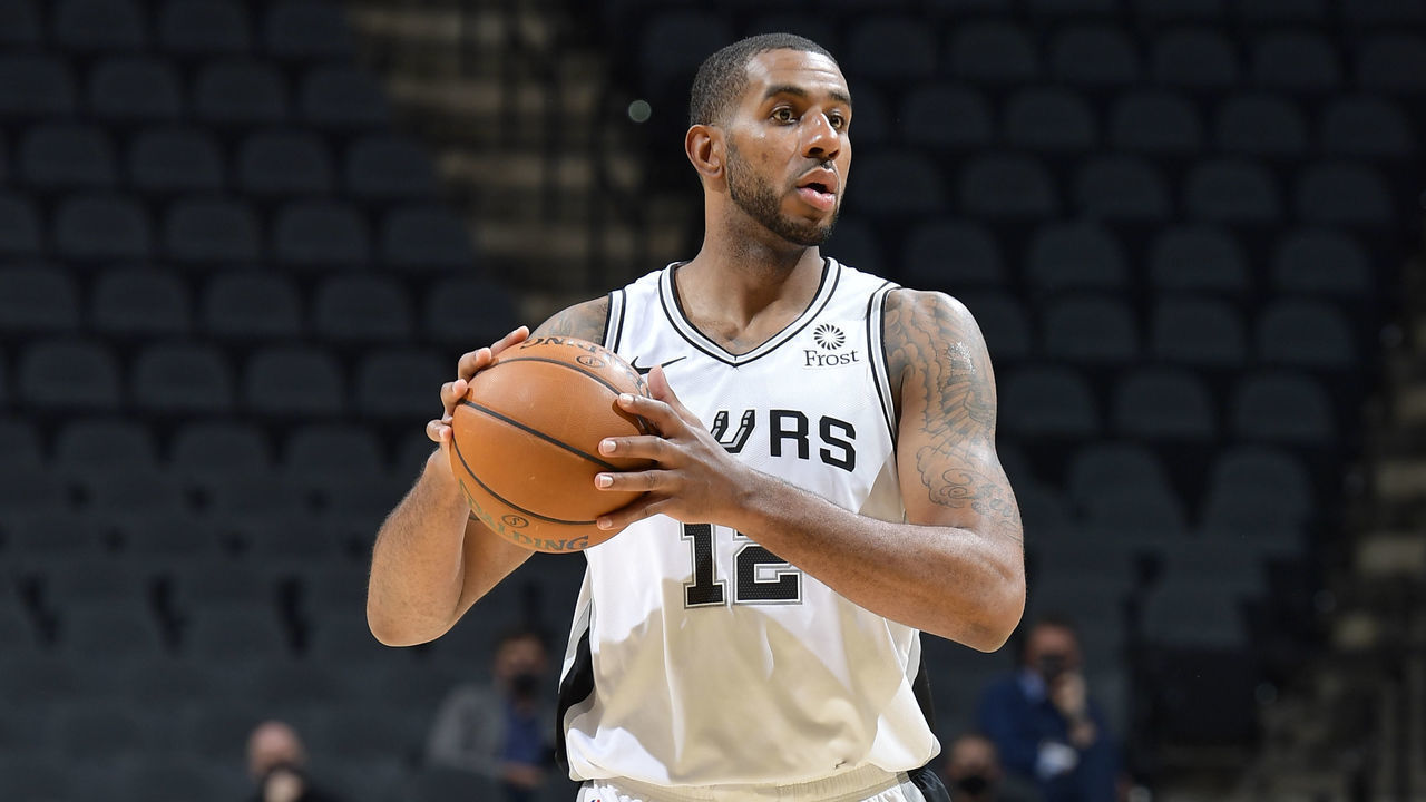 SAN ANTONIO, TX - JANUARY 30: LaMarcus Aldridge #12 of the San Antonio Spurs looks to pass the ball during the game against the Memphis Grizzlies on January 30, 2021 at the AT&T Center in San Antonio, Texas. Mandatory Copyright Notice: Copyright 2021 NBAE (Photos by Logan Riely/NBAE via Getty Images)