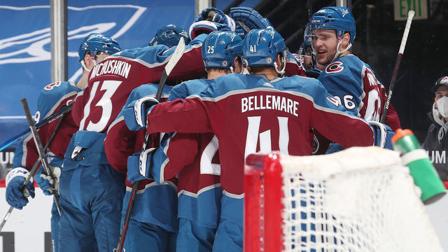 DENVER, COLORADO - MARCH 10: Members of the Colorado Avalanche celebrate a game winning goal by Gabriel Landeskog #92 against the Arizona Coyotes at Ball Arena on March 10, 2021 in Denver, Colorado. The Avalanche defeated the Coyotes 2-1 in overtime.