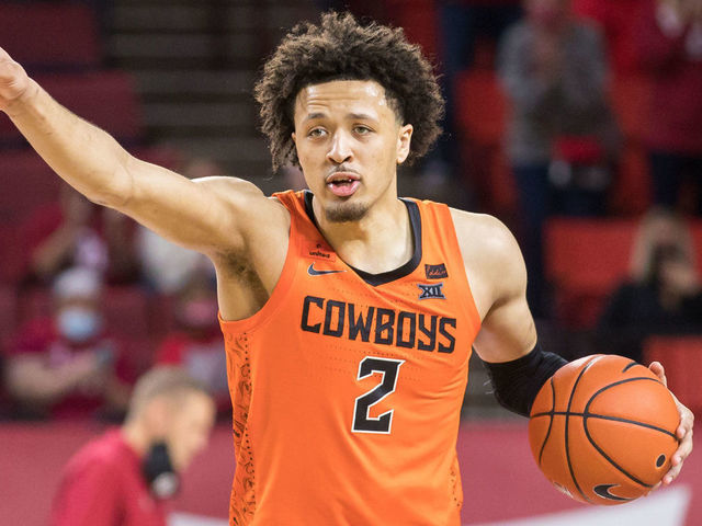 NORMAN, OK - FEBRUARY 27: Oklahoma State Cowboys guard Cade Cunningham (2) calls a play during overtime against the Oklahoma Sooners on February 27th, 2021 at Lloyd Noble Center in Norman Oklahoma.