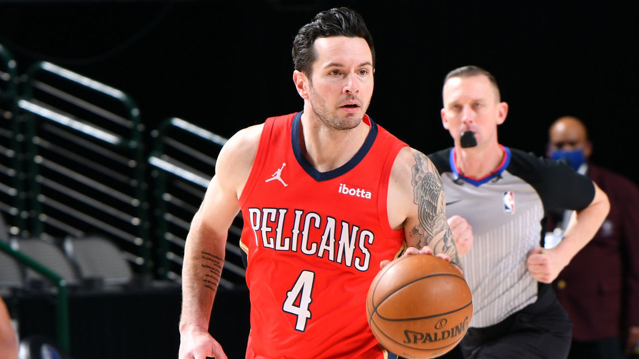 DALLAS, TX - FEBRUARY 12: JJ Redick #4 of the New Orleans Pelicans dribbles the ball during the game against the Dallas Mavericks on February 12, 2021 at the American Airlines Center in Dallas, Texas. Mandatory Copyright Notice: Copyright 2021 NBAE
