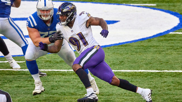 INDIANAPOLIS, IN - NOVEMBER 08: Baltimore Ravens defensive end Yannick Ngakoue (91) battles with Indianapolis Colts offensive tackle Braden Smith (72) in action during a NFL game between the Indianapolis Colts and the Baltimore Ravens on November 08, 2020 at Lucas Oil Stadium in Indianapolis, IN.