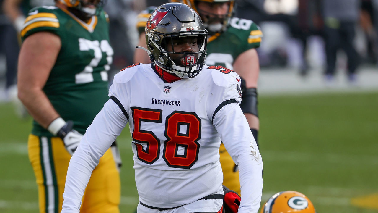 GREEN BAY, WISCONSIN - JANUARY 24: Shaquil Barrett #58 of the Tampa Bay Buccaneers celebrates after recording a sack in the first quarter against the Green Bay Packers during the NFC Championship game at Lambeau Field on January 24, 2021 in Green Bay, Wisconsin.