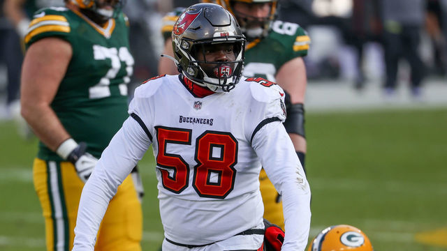 GREEN BAY, WISCONSIN - JANUARY 24: Shaquil Barrett #58 of the Tampa Bay Buccaneers celebrates after recording a sack in the first quarter against the Green Bay Packers during the NFC Championship game at Lambeau Field on January 24, 2021 in Green Bay, Wisconsin.