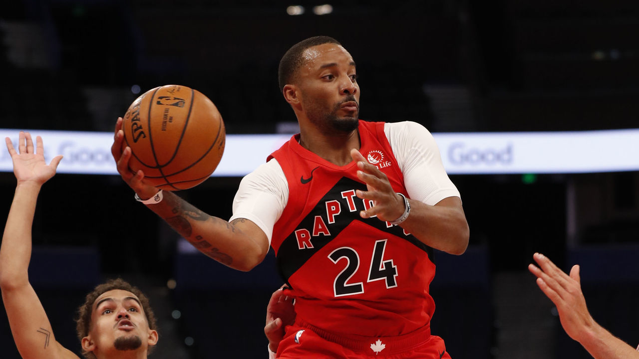 TAMPA, FL- MARCH 11: Norman Powell #24 of the Toronto Raptors passes the ball during the game against the Atlanta Hawks on March 11, 2021 at Amalie Arena in Tampa, Florida. Mandatory Copyright Notice: Copyright 2021 NBAE