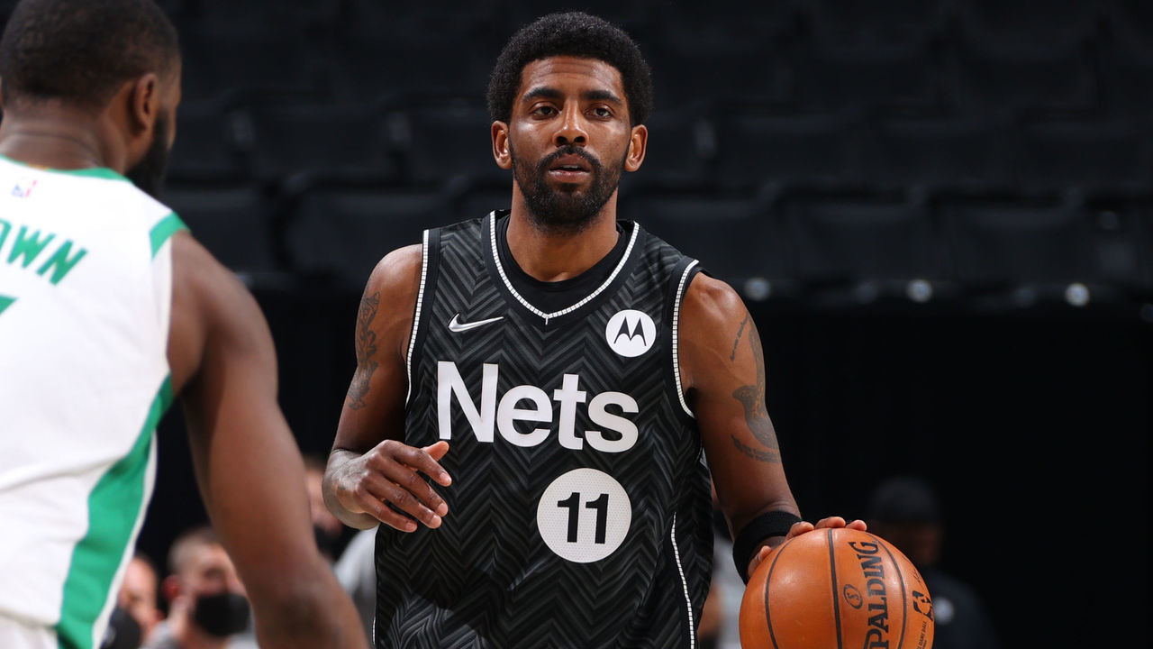 BROOKLYN, NY - MARCH 11: Kyrie Irving #11 of the Brooklyn Nets dribbles the ball during the game against the Boston Celtics on March 11, 2021 at Barclays Center in Brooklyn, New York. Mandatory Copyright Notice: Copyright 2021 NBAE