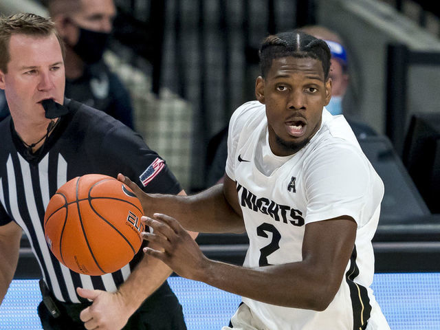 ORLANDO, FL - JANUARY 27: UCF Knights guard Darius Perry (2) looks to pass the ball during the basketball game between the UCF Knights and the and the East North Carolina on January 27 in Orlando, FL.