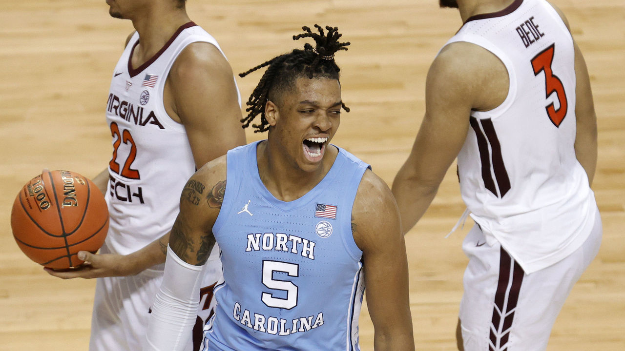 GREENSBORO, NORTH CAROLINA - MARCH 11: Armando Bacot #5 of the North Carolina Tar Heels reacts following a dunk during the second half of their quarterfinals game against the Virginia Tech Hokies in the ACC Men's Basketball Tournament at Greensboro Coliseum on March 11, 2021 in Greensboro, North Carolina.