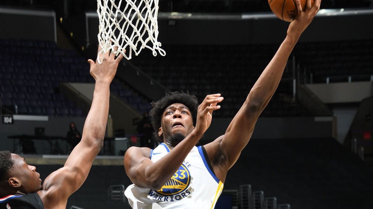 LOS ANGELES, CA - MARCH 11: James Wiseman #33 of the Golden State Warriors drives to the basket during the game against the LA Clippers on March 11, 2021 at STAPLES Center in Los Angeles, California. NOTE TO USER: User expressly acknowledges and agrees that, by downloading and/or using this Photograph, user is consenting to the terms and conditions of the Getty Images License Agreement. Mandatory Copyright Notice: Copyright 2021 NBAE