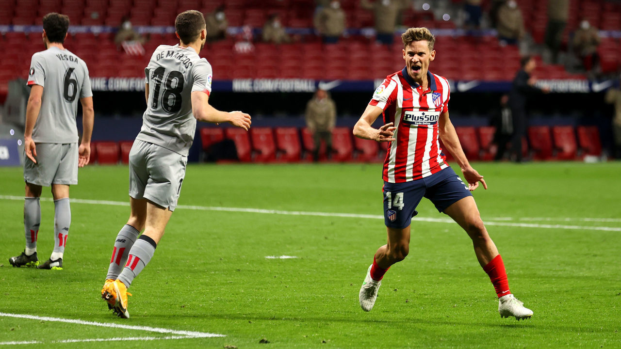 MADRID, SPAIN - MARCH 10: Marcos Llorente of Atletico Madrid celebrates after scoring their team's first goal during the La Liga Santander match between Atletico de Madrid and Athletic Club at Estadio Wanda Metropolitano on March 10, 2021 in Madrid, Spain. Sporting stadiums around Spain remain under strict restrictions due to the Coronavirus Pandemic as Government social distancing laws prohibit fans inside venues resulting in games being played behind closed doors.