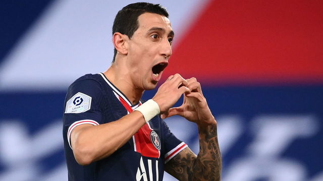 Paris Saint-Germain's Argentinian midfielder Angel Di Maria celebrates after scoring a goal during the French L1 football match between Paris Saint-Germain and Nimes Olympique at the Parc des Princes stadium in Paris on February 3, 2021.