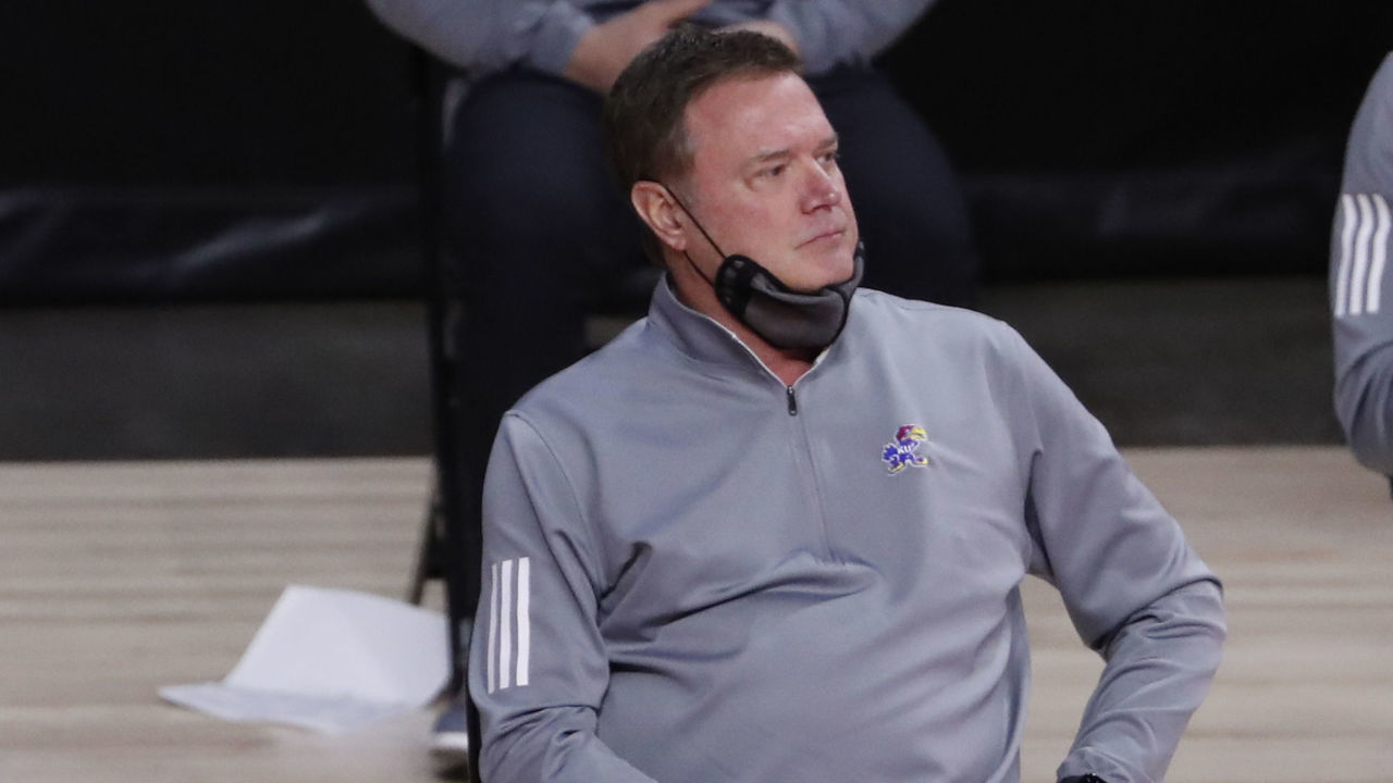 AMES, IA - FEBRUARY 13: Head coach Bill Self of the Kansas Jayhawks coaches from the bench in the first half of play at Hilton Coliseum on February 13, 2021 in Ames, Iowa. The Kansas Jayhawks won 64-50 over the Iowa State Cyclones.