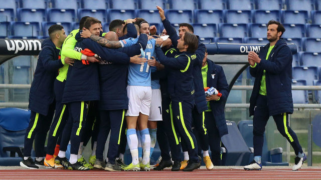 ROME, ITALY - MARCH 12: Luis Alberto of S.S. Lazio celebrates with Joaquin Correa and team mates after scoring their side's second goal during the Serie A match between SS Lazio and FC Crotone at Stadio Olimpico on March 12, 2021 in Rome, Italy. Sporting stadiums around Italy remain under strict restrictions due to the Coronavirus Pandemic as Government social distancing laws prohibit fans inside venues resulting in games being played behind closed doors.
