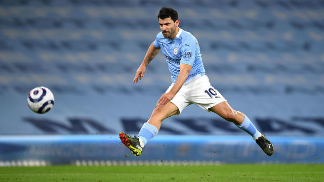 MANCHESTER, ENGLAND - MARCH 10: Sergio Aguero of Manchester City shoots during the Premier League match between Manchester City and Southampton at Etihad Stadium on March 10, 2021 in Manchester, England. Sporting stadiums around the UK remain under strict restrictions due to the Coronavirus Pandemic as Government social distancing laws prohibit fans inside venues resulting in games being played behind closed doors.