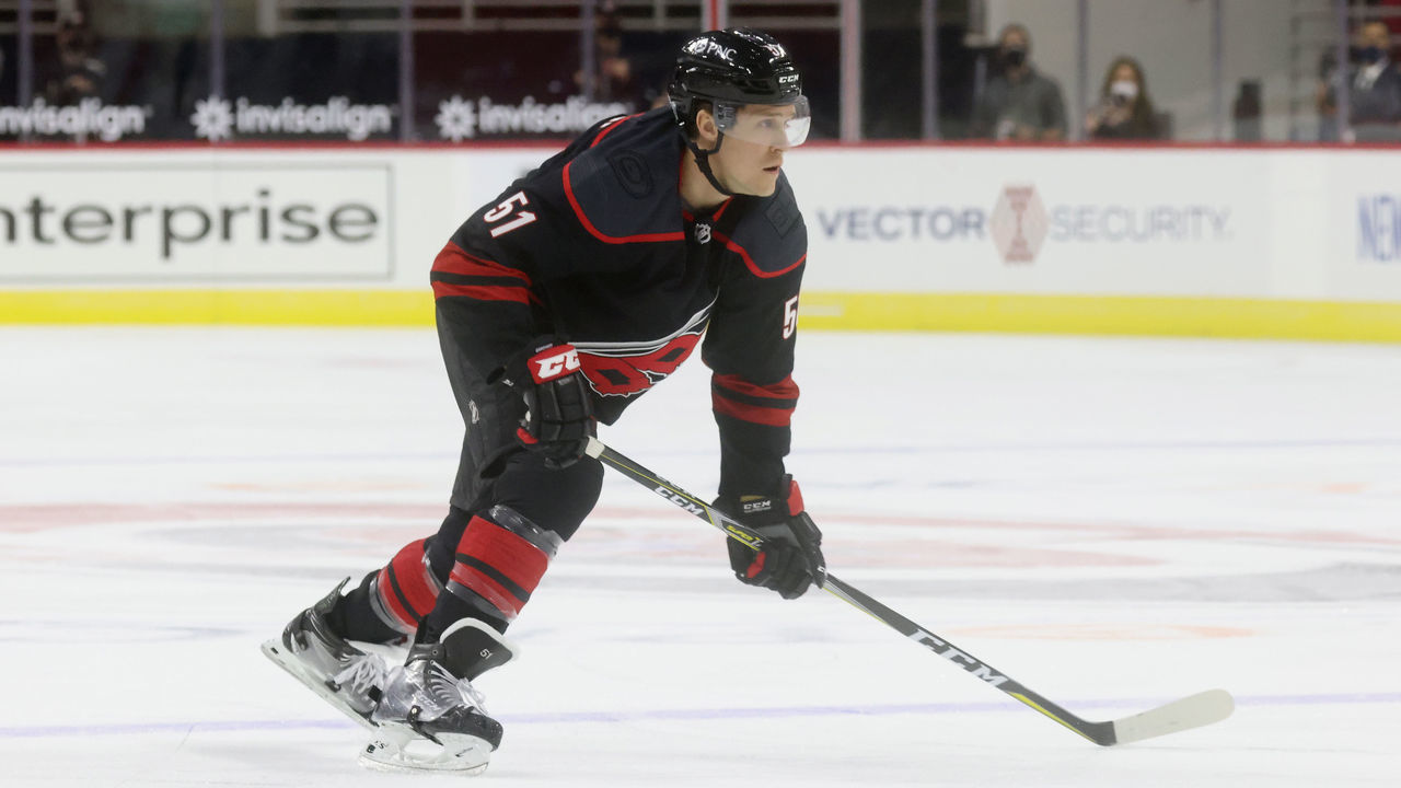 RALEIGH, NC - JANUARY 28: Jake Gardiner #51 of the Carolina Hurricanes skates for position on the ice during an NHL game against the Tampa Bay Lightning on January 28, 2021 at PNC Arena in Raleigh, North Carolina.