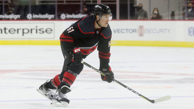 RALEIGH, NC - JANUARY 28: Jake Gardiner #51 of the Carolina Hurricanes skates for position on the ice during an NHL game against the Tampa Bay Lightning on January 28, 2021 at PNC Arena in Raleigh, North Carolina.
