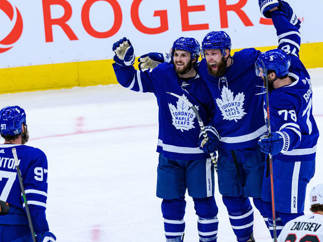 TORONTO, ON - FEBRUARY 17: Toronto Maple Leafs Center Alexander Kerfoot (15) celebrates his goal with Toronto Maple Leafs Defenceman Jake Muzzin (8), Defenceman T.J. Brodie (78) and Center Joe Thornton (97) during the third period of the NHL regular season game between the Ottawa Senators and the Toronto Maple Leafs on February 17, 2021, at Scotiabank Arena in Toronto, ON, Canada.