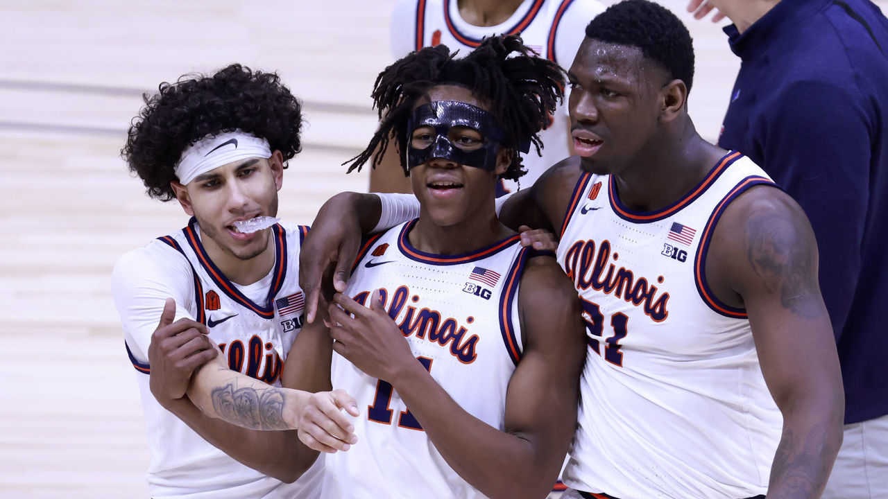 INDIANAPOLIS, INDIANA - MARCH 13: Ayo Dosunmu #11, Kofi Cockburn #21 and Andre Curbelo #5 of the Illinois Fighting Illini walk off the court after a win over the Iowa Hawkeyes in the Big Ten men's basketball tournament semifinals at Lucas Oil Stadium on March 13, 2021 in Indianapolis, Indiana.