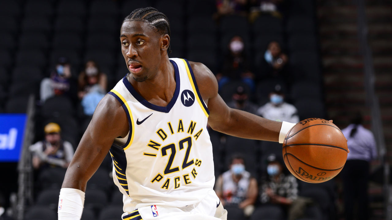 PHOENIX, AZ - MARCH 13: Caris LaVert #22 of the Indiana Pacers dribbles the ball during the game against the Phoenix Suns on March 13, 2021 at Talking Stick Resort Arena in Phoenix, Arizona. Mandatory Copyright Notice: Copyright 2021 NBAE