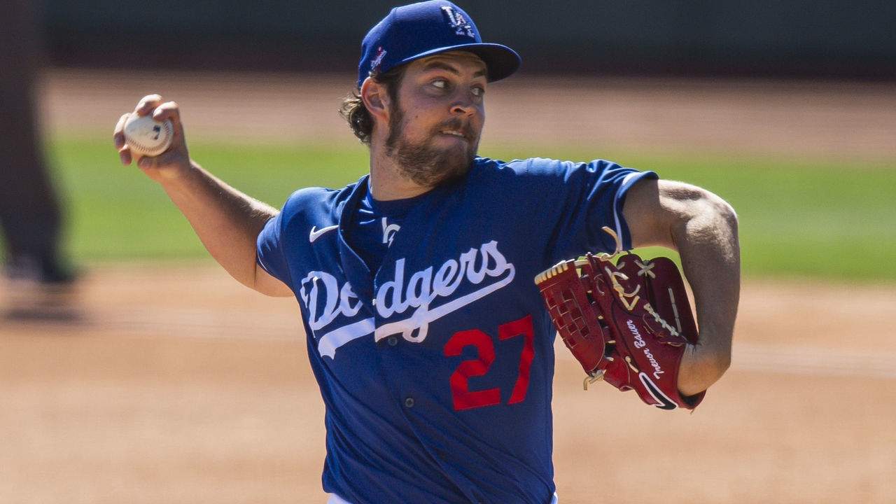 GLENDALE, AZ - MARCH 06: Trevor Bauer #27 of the Los Angeles Dodgers delivers a pitch against the San Diego Padres at Camelback Ranch on March 6, 2021 in Glendale, Arizona.