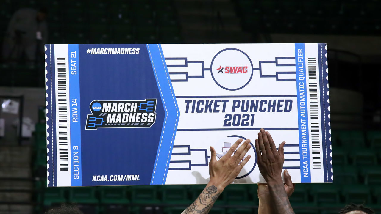 BIRMINGHAM, AL - MARCH 13: The Texas Southern Tigers hold up a sign showing their ticket to March Madness after winning the Cricket Wireless SWAC Men's Basketball Tournament championship game between the Texas Southern Tigers and the Prairie View A&M Panthers on March 13, 2021 at Bartow Arena in Birmingham, Alabama.