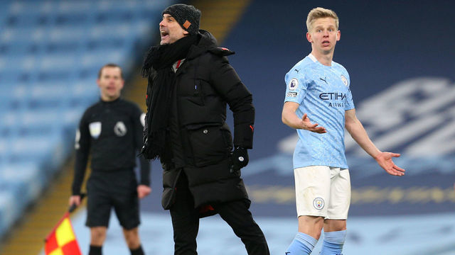 MANCHESTER, ENGLAND - JANUARY 30: Pep Guardiola, Manager of Manchester City gives his team instructions as Oleksandr Zinchenko of Manchester City reacts during the Premier League match between Manchester City and Sheffield United at Etihad Stadium on January 30, 2021 in Manchester, England. Sporting stadiums around the UK remain under strict restrictions due to the Coronavirus Pandemic as Government social distancing laws prohibit fans inside venues resulting in games being played behind closed doors.