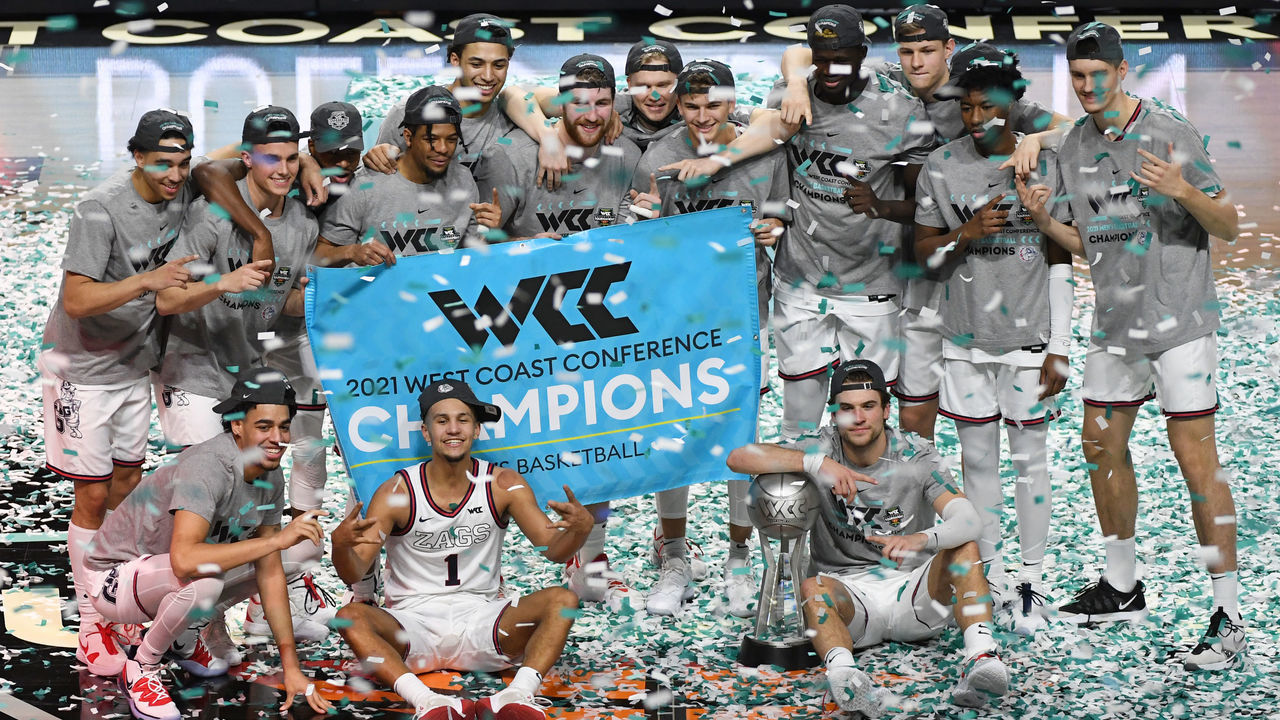 LAS VEGAS, NEVADA - MARCH 09: The Gonzaga Bulldogs celebrate on the court after their 88-78 victory over the Brigham Young Cougars to win the championship game of the West Coast Conference basketball tournament at the Orleans Arena on March 9, 2021 in Las Vegas, Nevada.