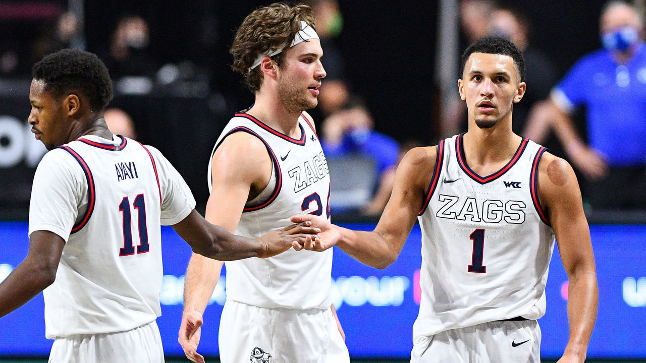 LAS VEGAS, NV - MARCH 09: Gonzaga guard Jalen Suggs (1) get high fives from Gonzaga forward Joel Ayayi (11) and Gonzaga forward Corey Kispert (24) during the championship game of the men's West Coast Conference basketball tournament between the BYU Cougars and the Gonzaga Bulldogs on March 9, 2021, at the Orleans Arena in Las Vegas, NV.
