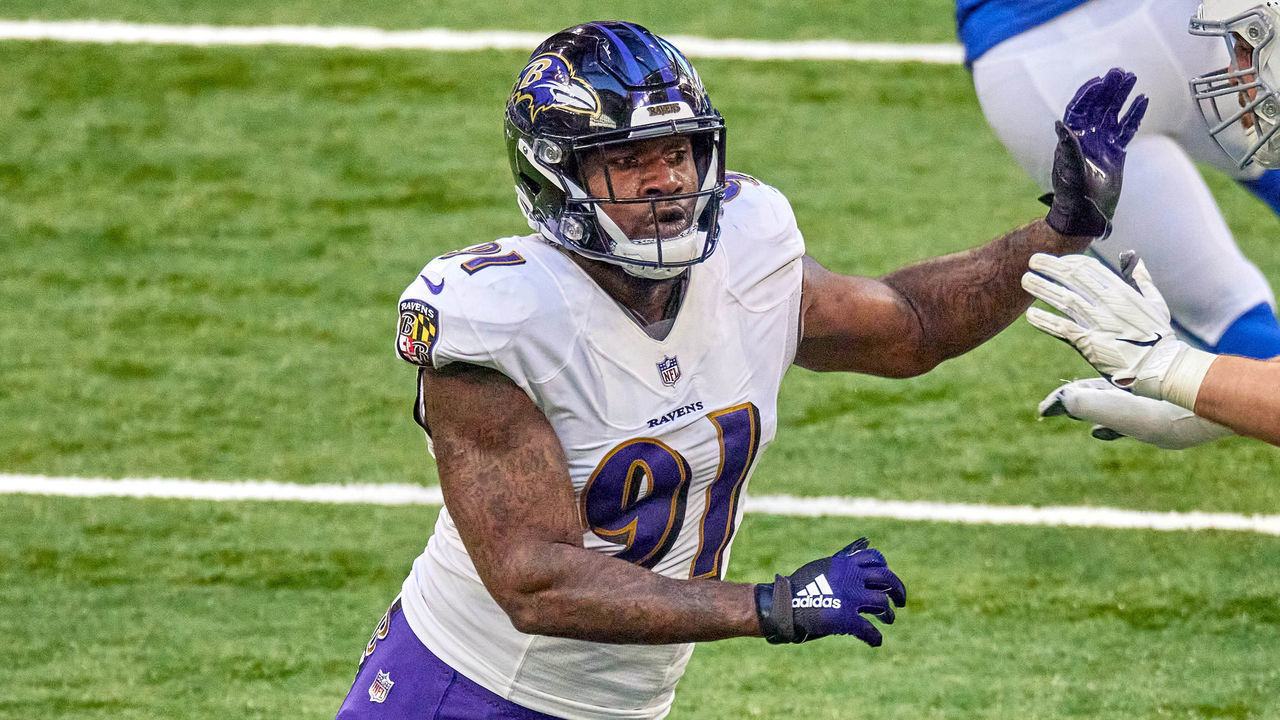INDIANAPOLIS, IN - NOVEMBER 08: Baltimore Ravens defensive end Yannick Ngakoue (91) battles with Indianapolis Colts offensive tackle Anthony Castonzo (74) in action during a NFL game between the Indianapolis Colts and the Baltimore Ravens on November 08, 2020 at Lucas Oil Stadium in Indianapolis, IN.