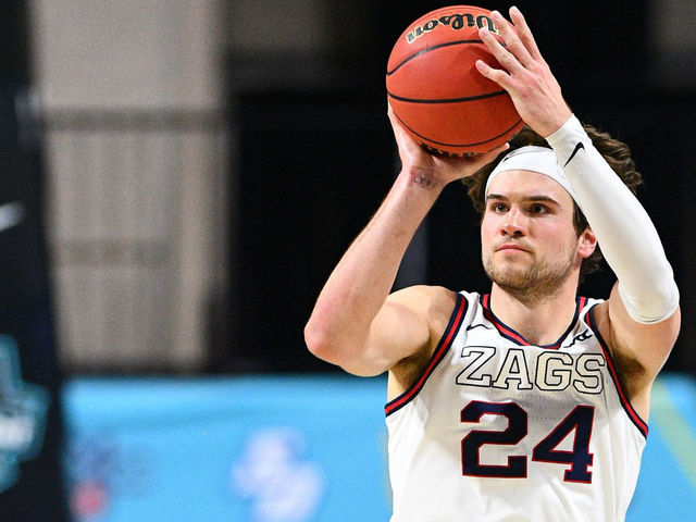 LAS VEGAS, NV - MARCH 09: Gonzaga forward Corey Kispert (24) shoots a three pointer during the championship game of the men's West Coast Conference basketball tournament between the BYU Cougars and the Gonzaga Bulldogs on March 9, 2021, at the Orleans Arena in Las Vegas, NV.