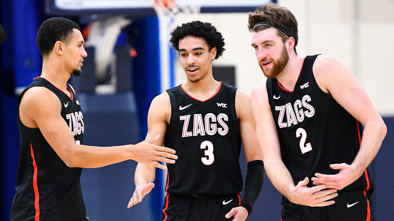 MALIBU, CA - JANUARY 30: Gonzaga guard Jalen Suggs (1), Gonzaga guard Andrew Nembhard (3) and Gonzaga forward Drew Timme (2) celebrate during the college basketball game between the Gonzaga Bulldogs and the Pepperdine Waves on January 30, 2021 at the Firestone Fieldhouse in Malibu, CA. The game was played without fans due to the COVID-19 pandemic.