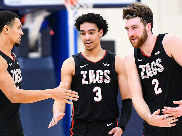 MALIBU, CA - JANUARY 30: Gonzaga guard Jalen Suggs (1), Gonzaga guard Andrew Nembhard (3) and Gonzaga forward Drew Timme (2) celebrate during the college basketball game between the Gonzaga Bulldogs and the Pepperdine Waves on January 30, 2021 at the Firestone Fieldhouse in Malibu, CA. The game was played without fans due to the COVID-19 pandemic.