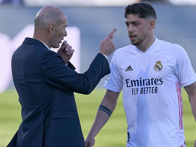 MADRID, SPAIN - MARCH 13: Zinedine Zidane head Coach and Federico Valverde of Real Madrid speaks during the La Liga Santander match between Real Madrid and Elche CF at Estadio Alfredo Di Stefano on March 13, 2021 in Madrid, Spain.