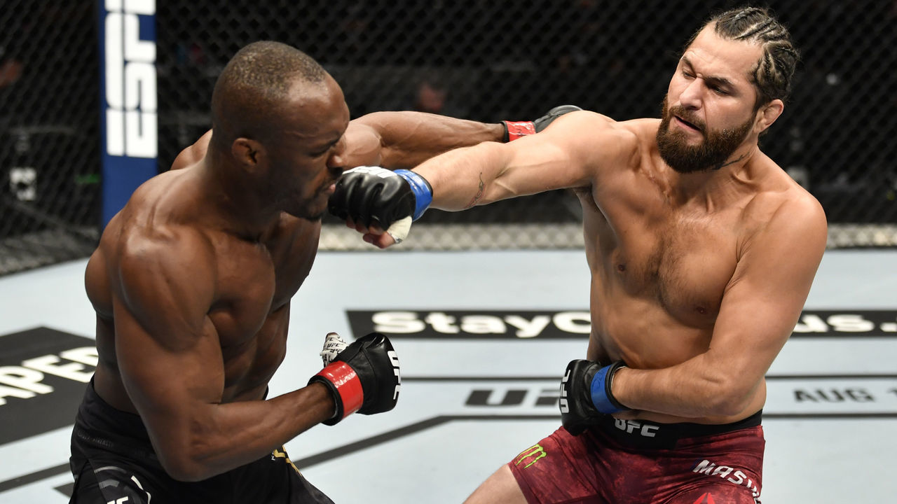 ABU DHABI, UNITED ARAB EMIRATES - JULY 12: (R-L) Jorge Masvidal punches Kamaru Usman of Nigeria in their UFC welterweight championship fight during the UFC 251 event at Flash Forum on UFC Fight Island on July 12, 2020 on Yas Island, Abu Dhabi, United Arab Emirates.