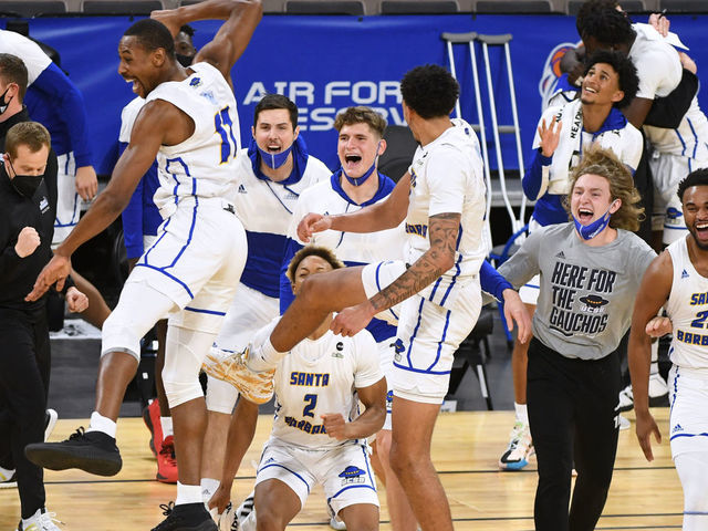 LAS VEGAS, NEVADA - MARCH 13: UC Santa Barbara players celebrate their 79-63 victory over the UC Irvine Anteaters in the championship game of the Big West Basketball tournament at Michelob ULTRA Arena on March 13, 2021 in Las Vegas, Nevada.