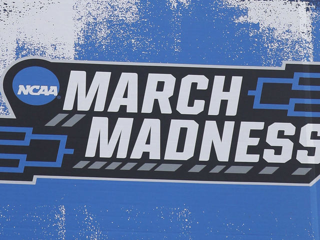 INDIANAPOLIS, IN - MARCH 9: A generic view of a large March Madness banner hanging from Bankers Life Fieldhouse before the 2021 NCAA Men's Final Four as seen on March 9, 2021 in Indianapolis, IN.