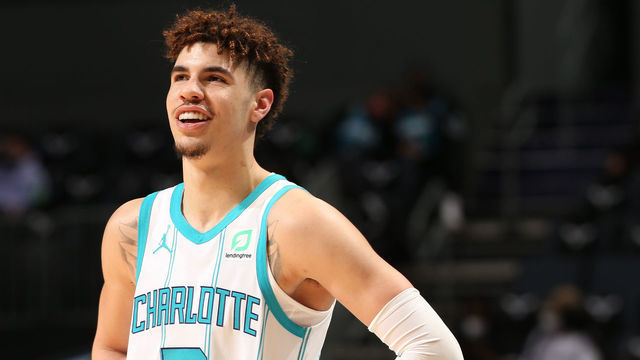 CHARLOTTE, NC - MARCH 15: LaMelo Ball #2 of the Charlotte Hornets smiles during the game against the Sacramento Kings on March 15, 2021 at Spectrum Center in Charlotte, North Carolina. Mandatory Copyright Notice: Copyright 2021 NBAE