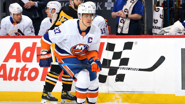 PITTSBURGH, PA - FEBRUARY 20: Anders Lee #27 of the New York Islanders skates against the Pittsburgh Penguins at PPG PAINTS Arena on February 20, 2021 in Pittsburgh, Pennsylvania.