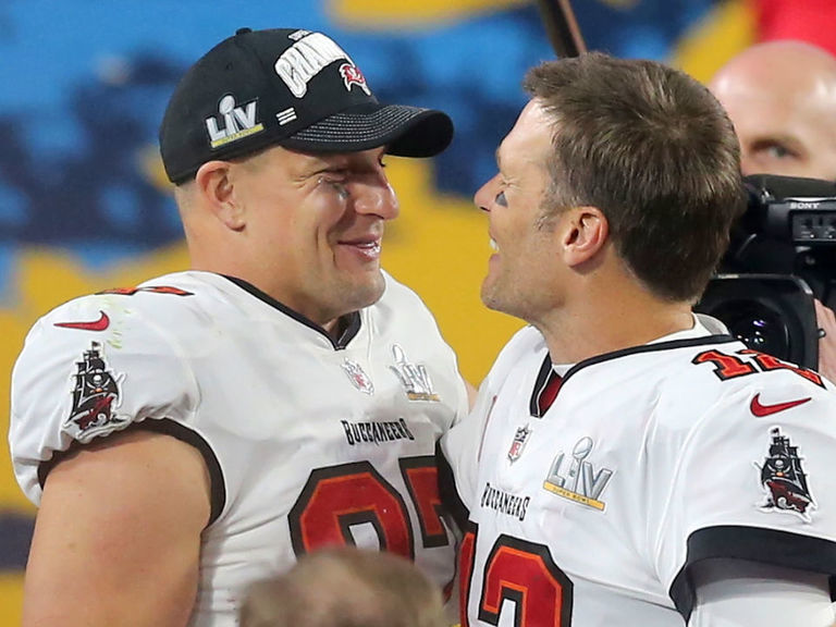 Gronk defends Brady's trophy toss He needed to 'step it up' a bit